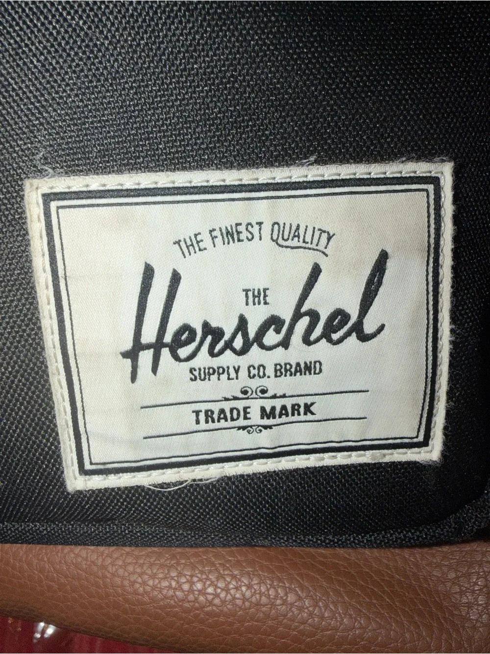 Herschel Black Canvas Backpack with Tan Accents